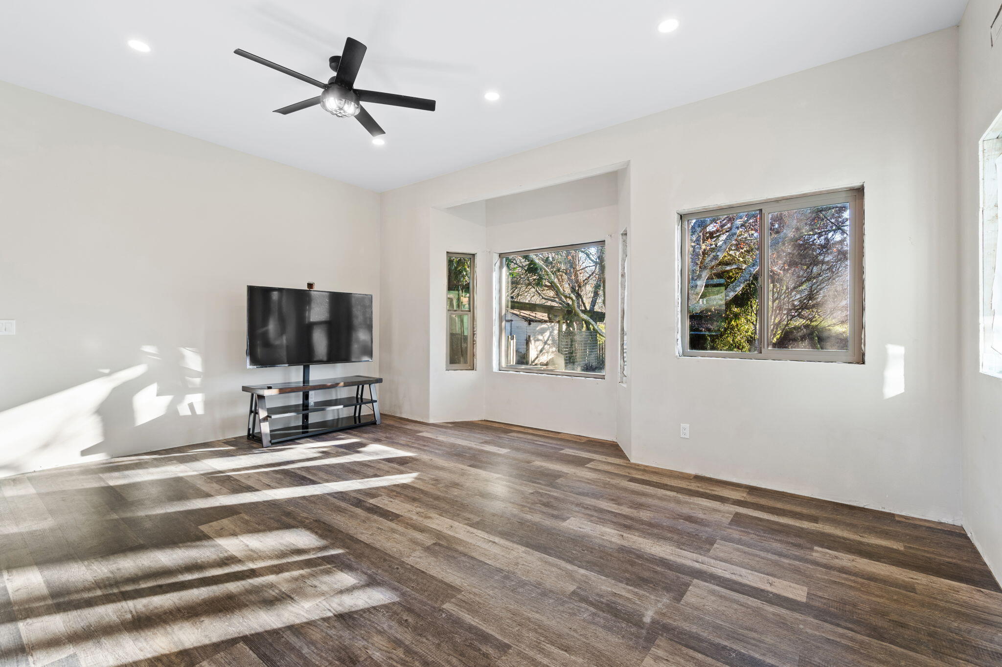 61 Kingston Road Fieldbrook, CA 95519 - Photo 11 of 48 a bedroom with furniture and a flat screen tv