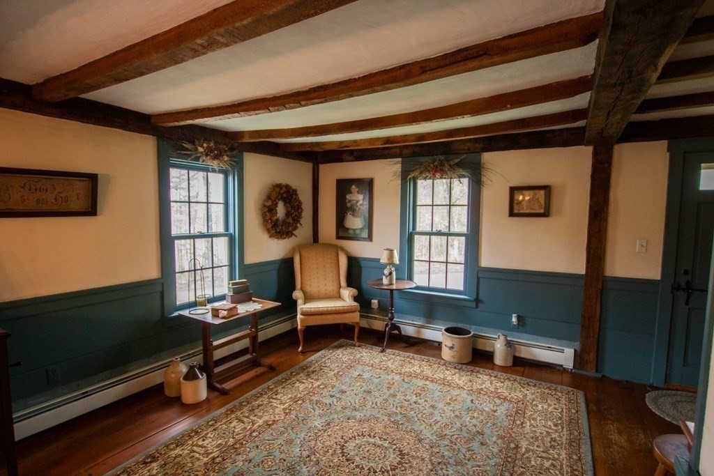 55 Rufus Putnam Road North Brookfield, MA 01535 - Photo 13 of 41 a living room with furniture rug and wooden floor