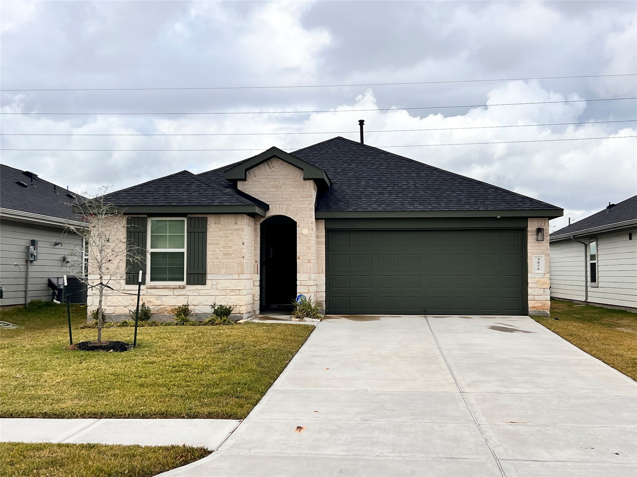 3826 Lanercost Lane Fulshear, TX 77441 - Photo 1 of 29 a front view of a house with garden