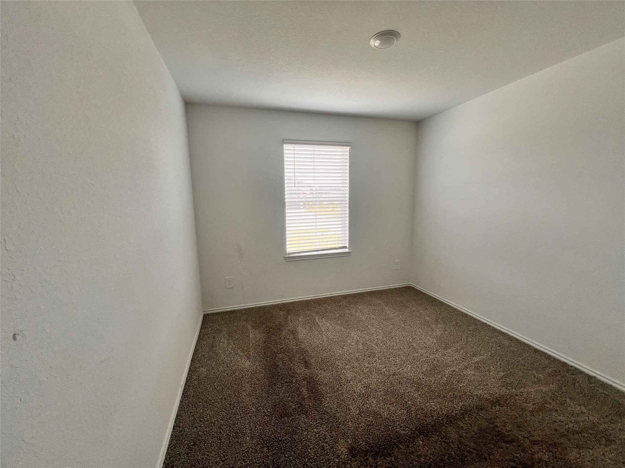 3826 Lanercost Lane Fulshear, TX 77441 - Photo 11 of 29 an empty room with a window