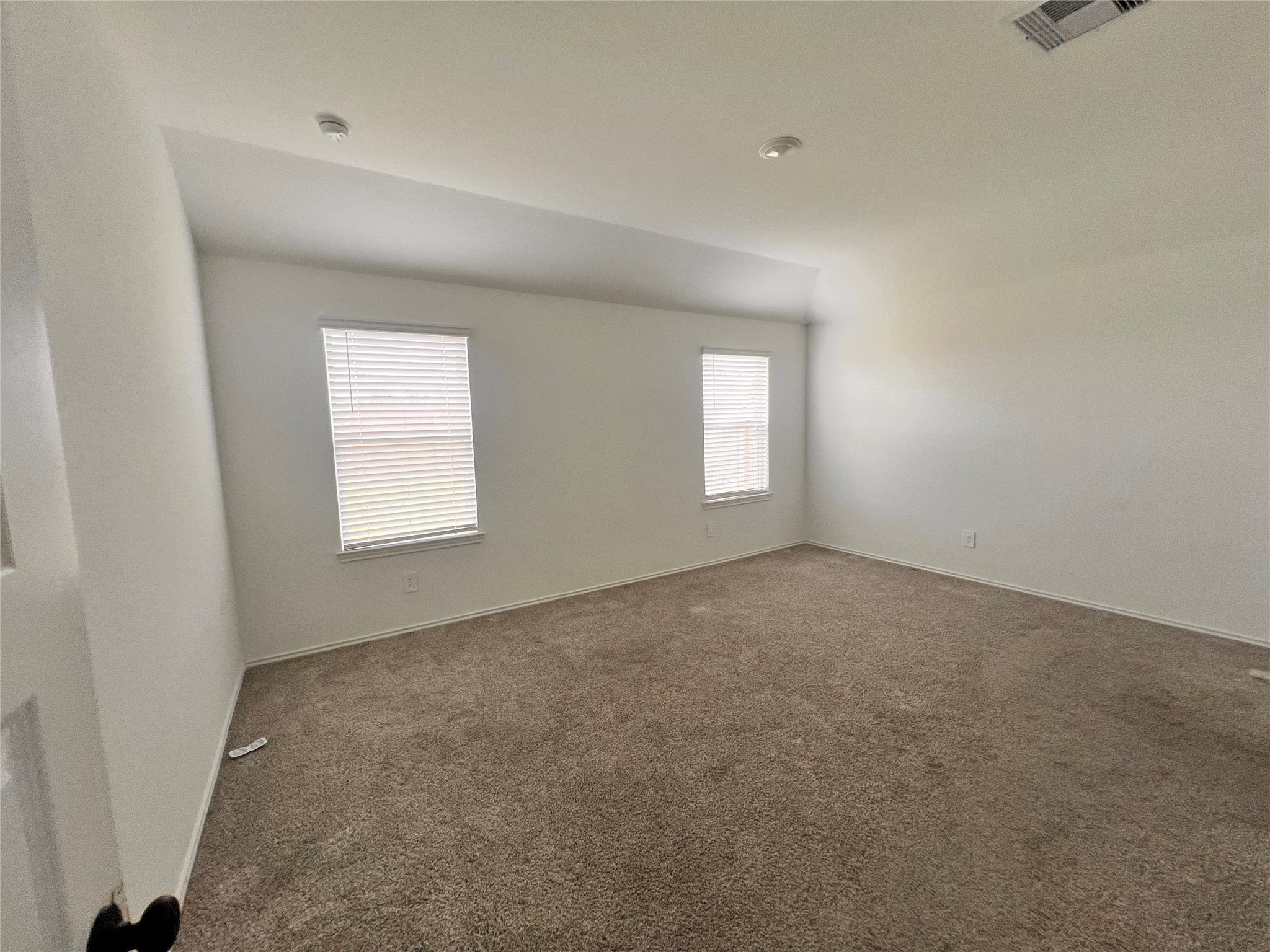 3826 Lanercost Lane Fulshear, TX 77441 - Photo 9 of 29 an empty room with windows