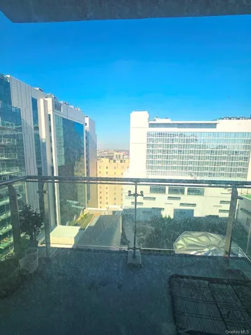 a bathroom with a bathtub and window