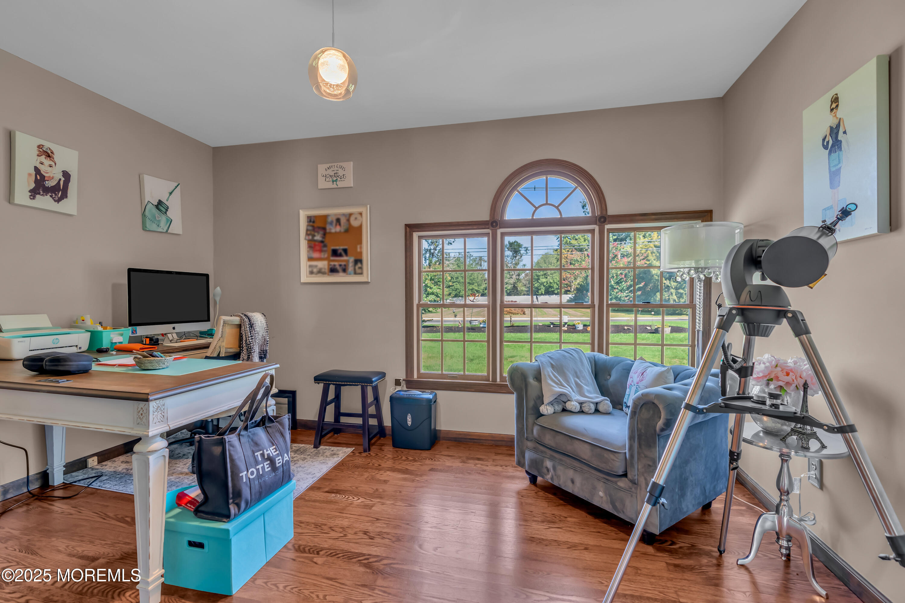 1417 Silverton Road Toms River, NJ 08755 - Photo 16 of 41 a living room with furniture a flat screen tv and a floor to ceiling window