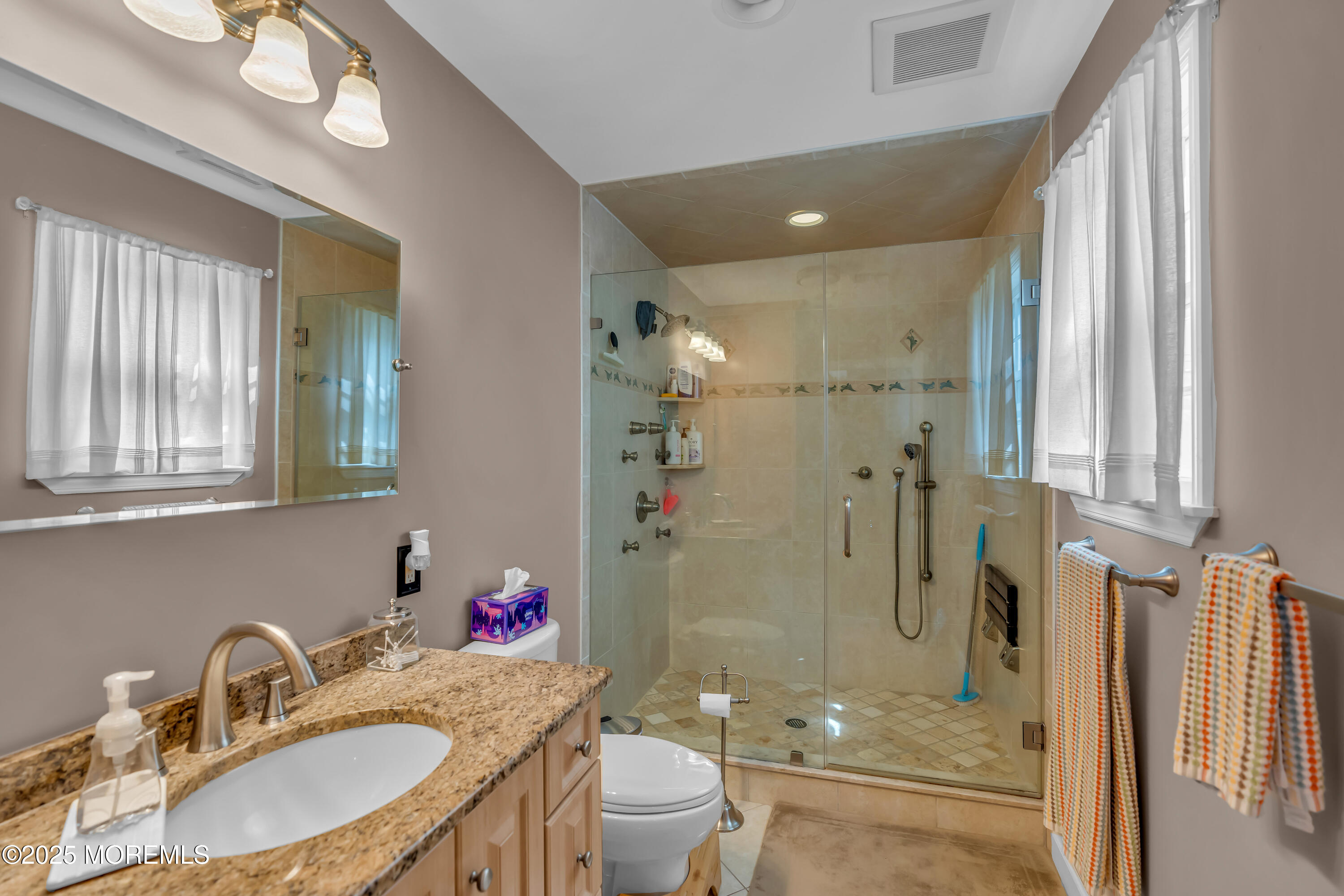 1417 Silverton Road Toms River, NJ 08755 - Photo 19 of 41 a bathroom with a granite countertop sink toilet and shower