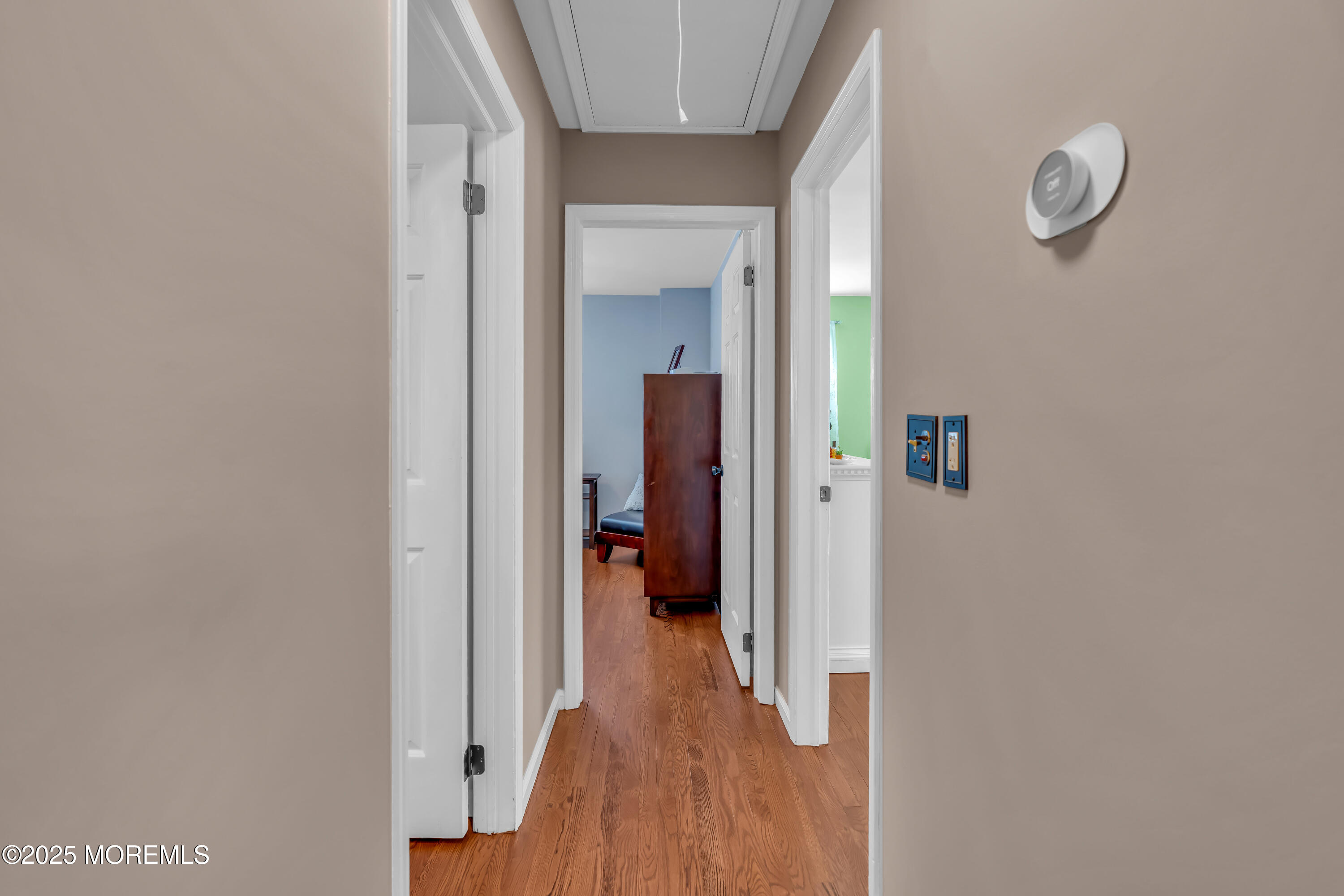 1417 Silverton Road Toms River, NJ 08755 - Photo 22 of 41 a view of a hallway with wooden floor and closet