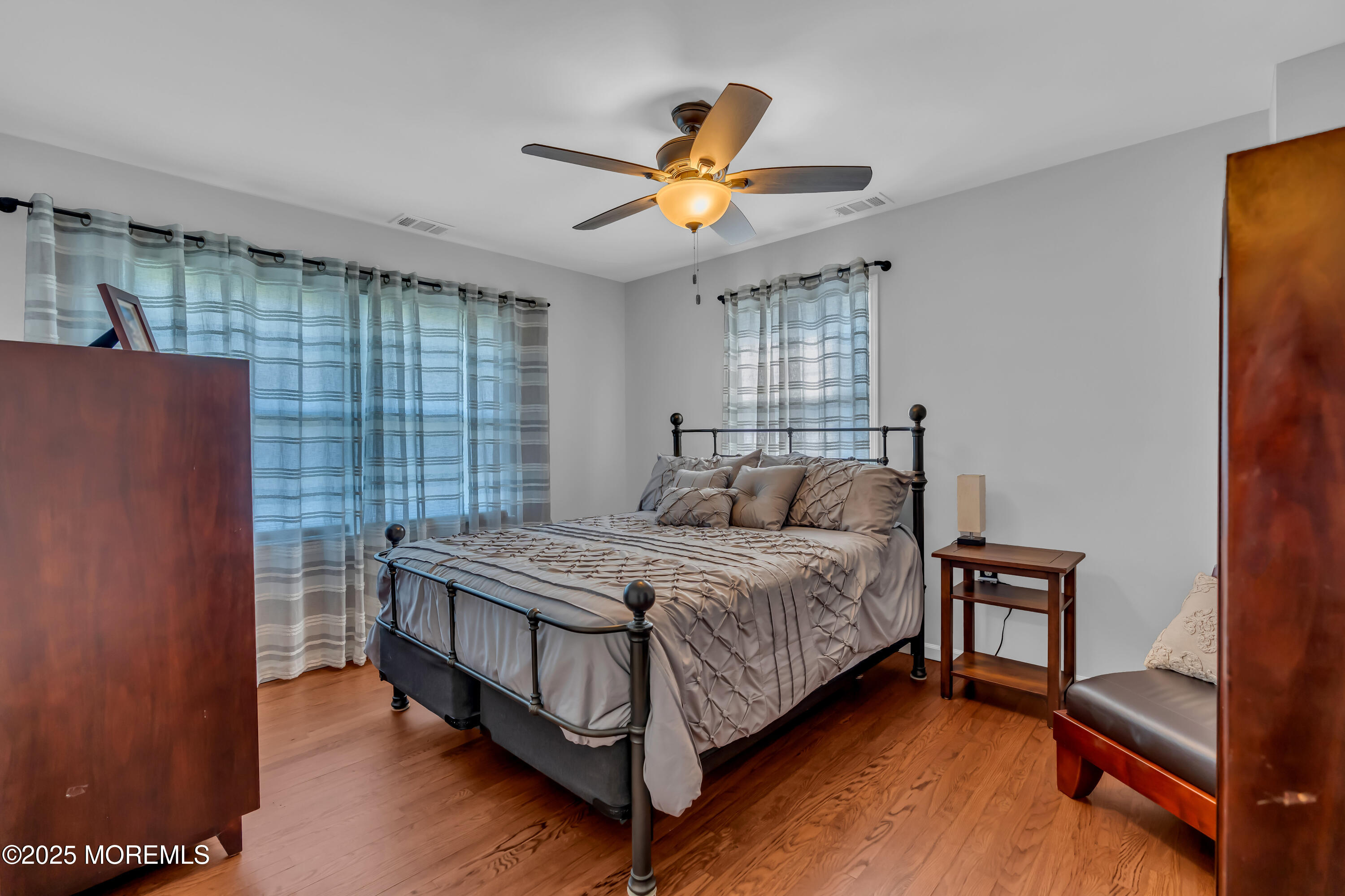 1417 Silverton Road Toms River, NJ 08755 - Photo 23 of 41 a bedroom with a bed and window