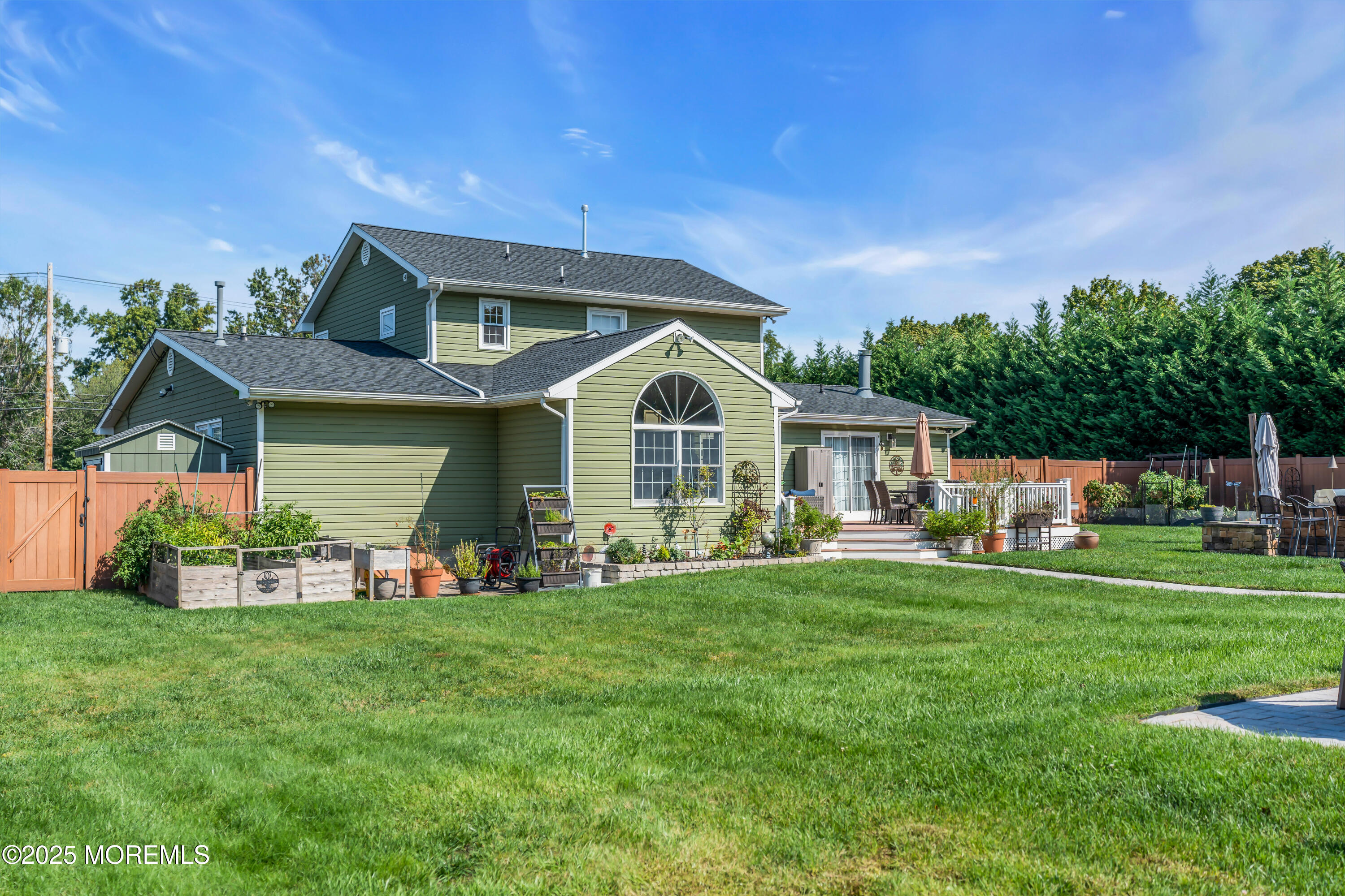 1417 Silverton Road Toms River, NJ 08755 - Photo 38 of 41 a front view of house with yard and green space