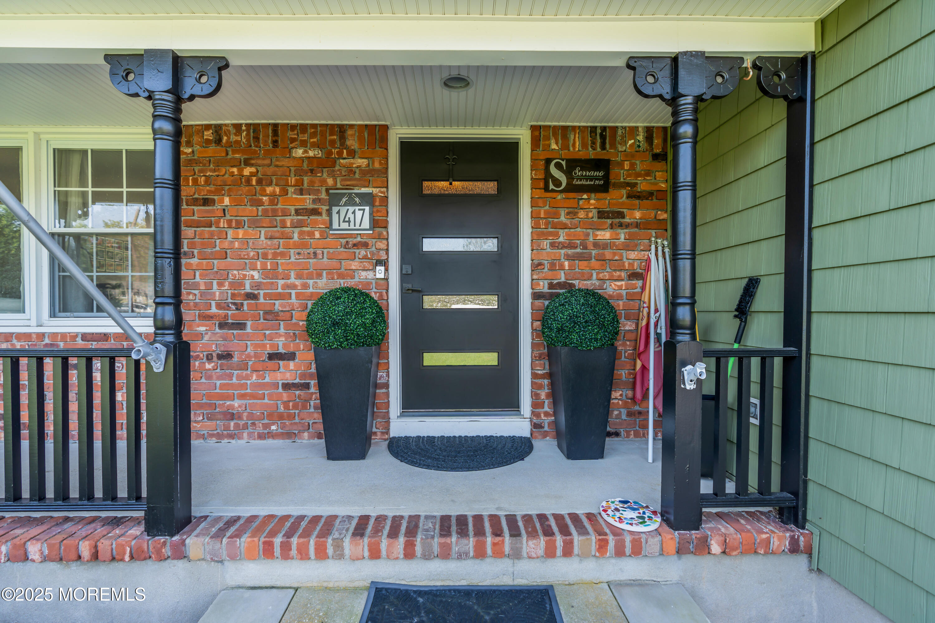 1417 Silverton Road Toms River, NJ 08755 - Photo 4 of 41 a couple of potted plants in front of door