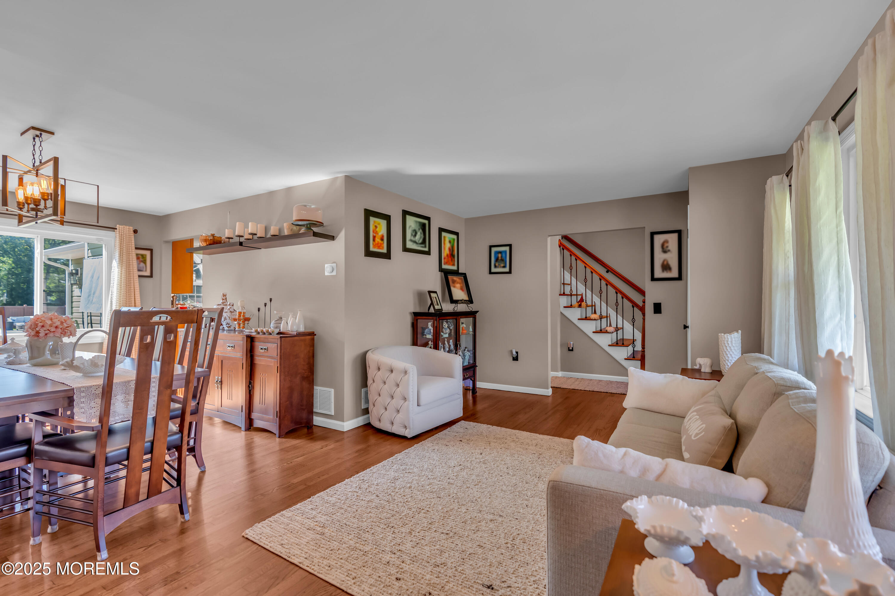1417 Silverton Road Toms River, NJ 08755 - Photo 6 of 41 a living room with furniture and wooden floor