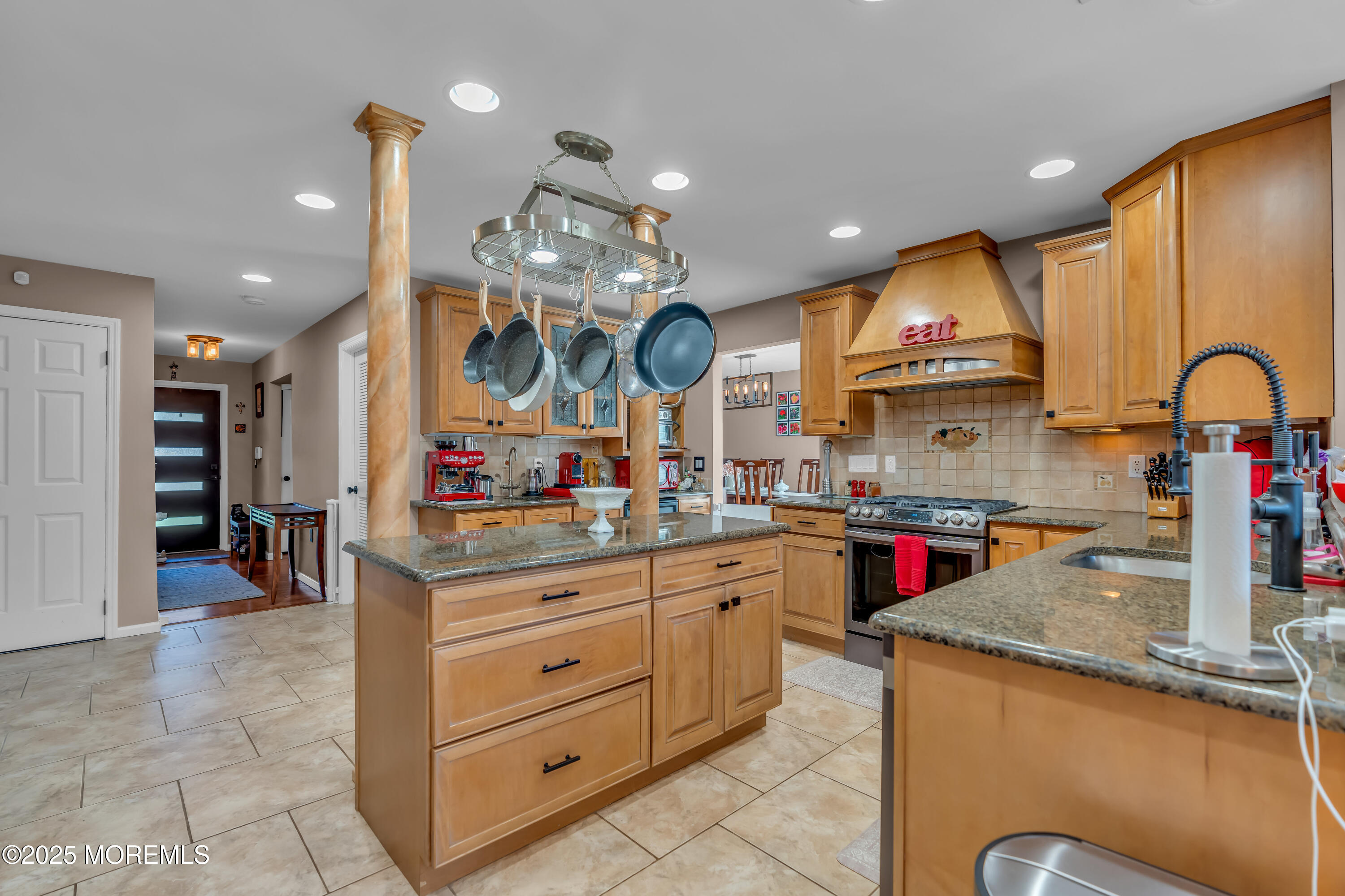 1417 Silverton Road Toms River, NJ 08755 - Photo 9 of 41 a kitchen with stainless steel appliances granite countertop a sink and cabinets