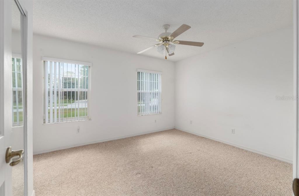 5393 Southwest 109th Place Road Ocala, FL 34476 - Photo 31 of 54 a view of an empty room with a window