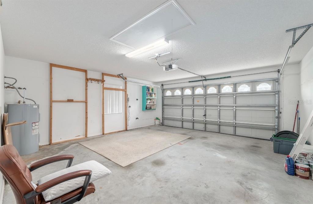 5393 Southwest 109th Place Road Ocala, FL 34476 - Photo 34 of 54 a view of a livingroom with furniture and a ceiling fan