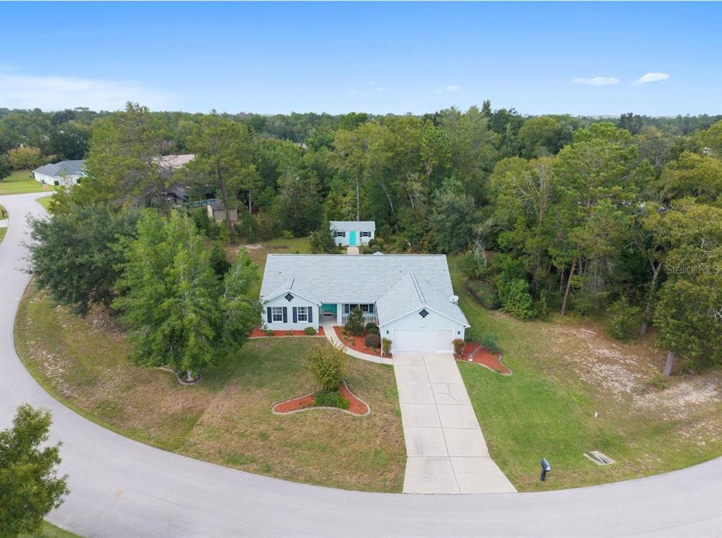 5393 Southwest 109th Place Road Ocala, FL 34476 - Photo 51 of 54 an aerial view of a house with a yard