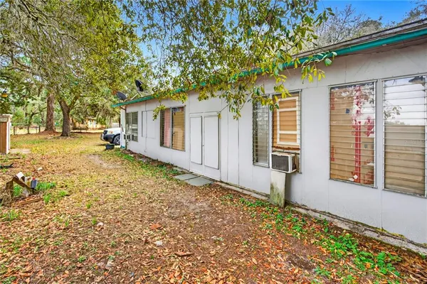a house with trees in front of it