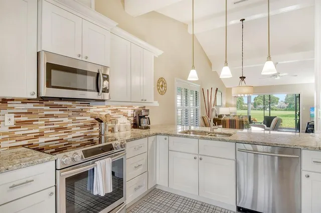 a white toilet sitting next to a bathroom