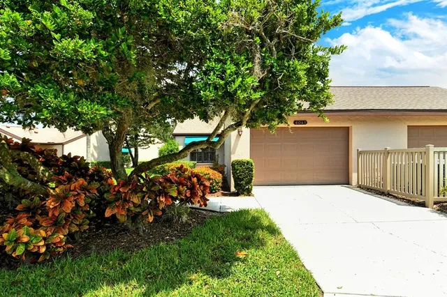 a view of a backyard of the house