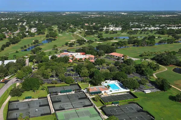 a view of a golf course with a lake