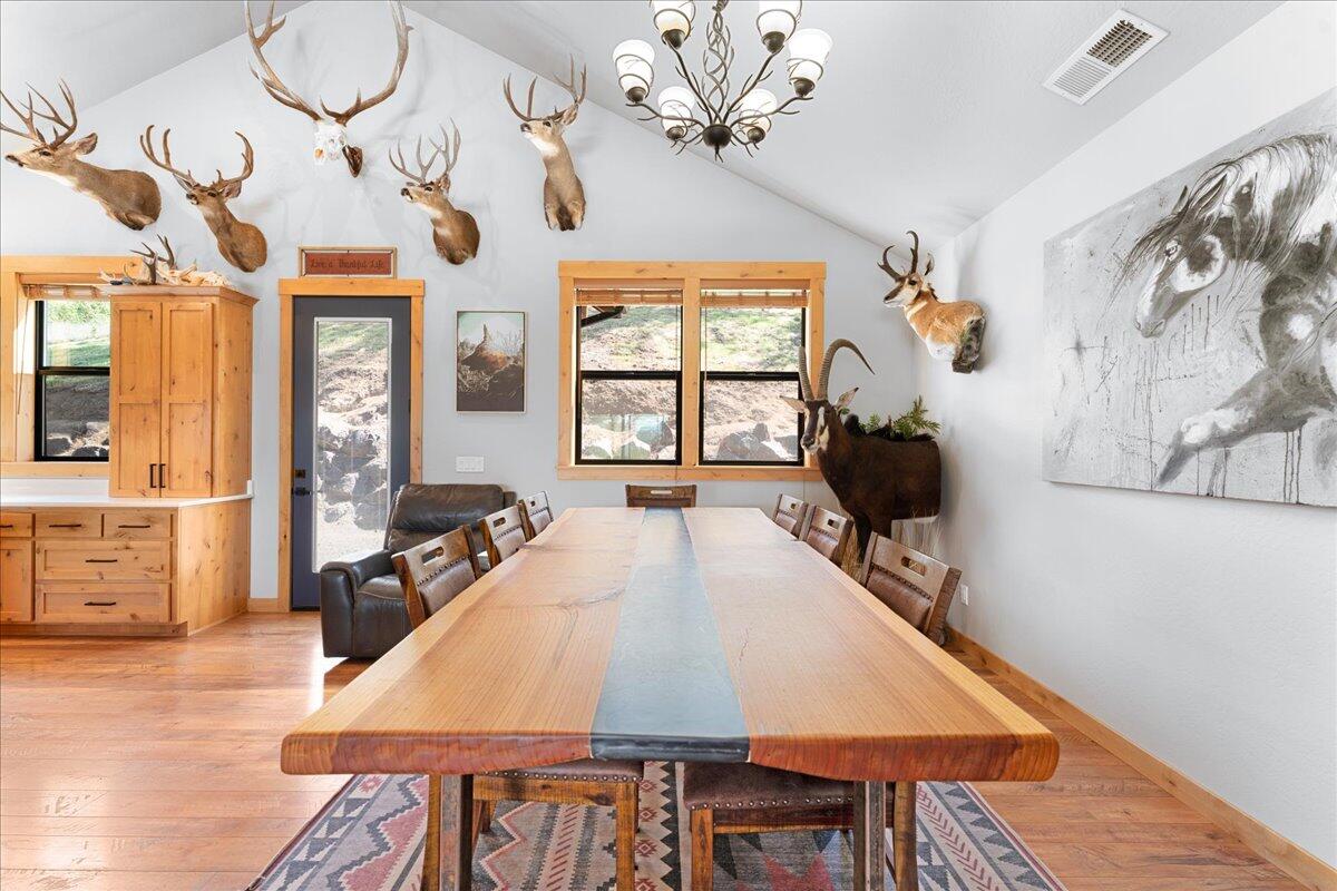2220 Butte Falls Highway Eagle Point, OR 97524 - Photo 21 of 69 a large dining hall with a large window table and chairs