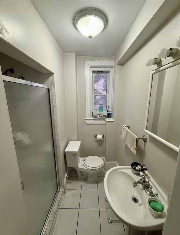 10 Fairfield Street, Unit 3 Boston, MA 02116 - Photo 7 of 8 a bathroom with a sink a mirror and a toilet