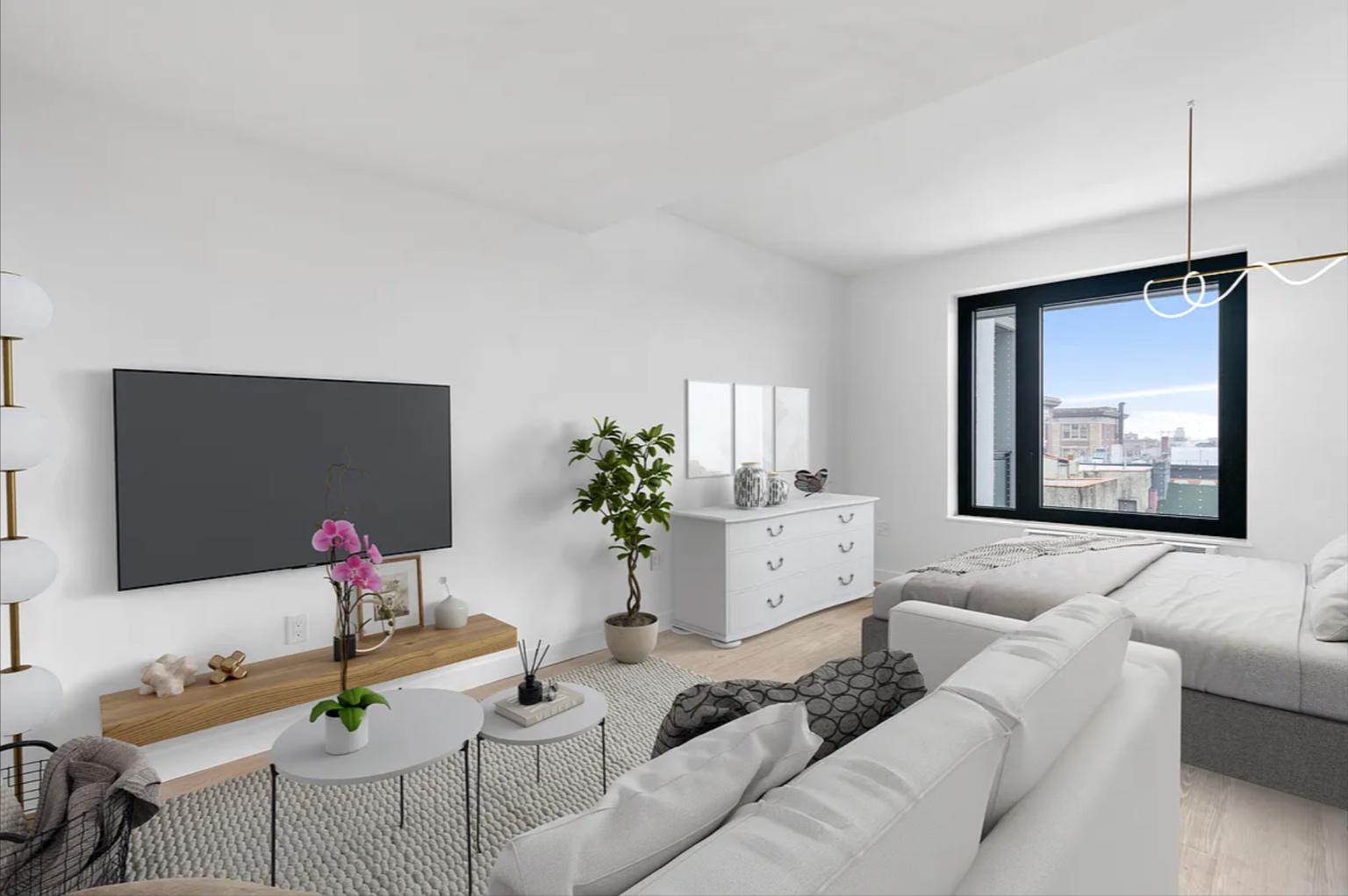 827 Sterling Place, Unit 3H Brooklyn, NY 11216 - Photo 1 of 12 a living room with furniture flowerpot and a window