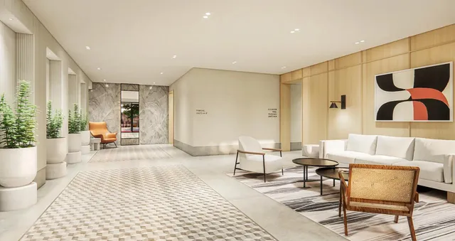 a living room with furniture and lamp