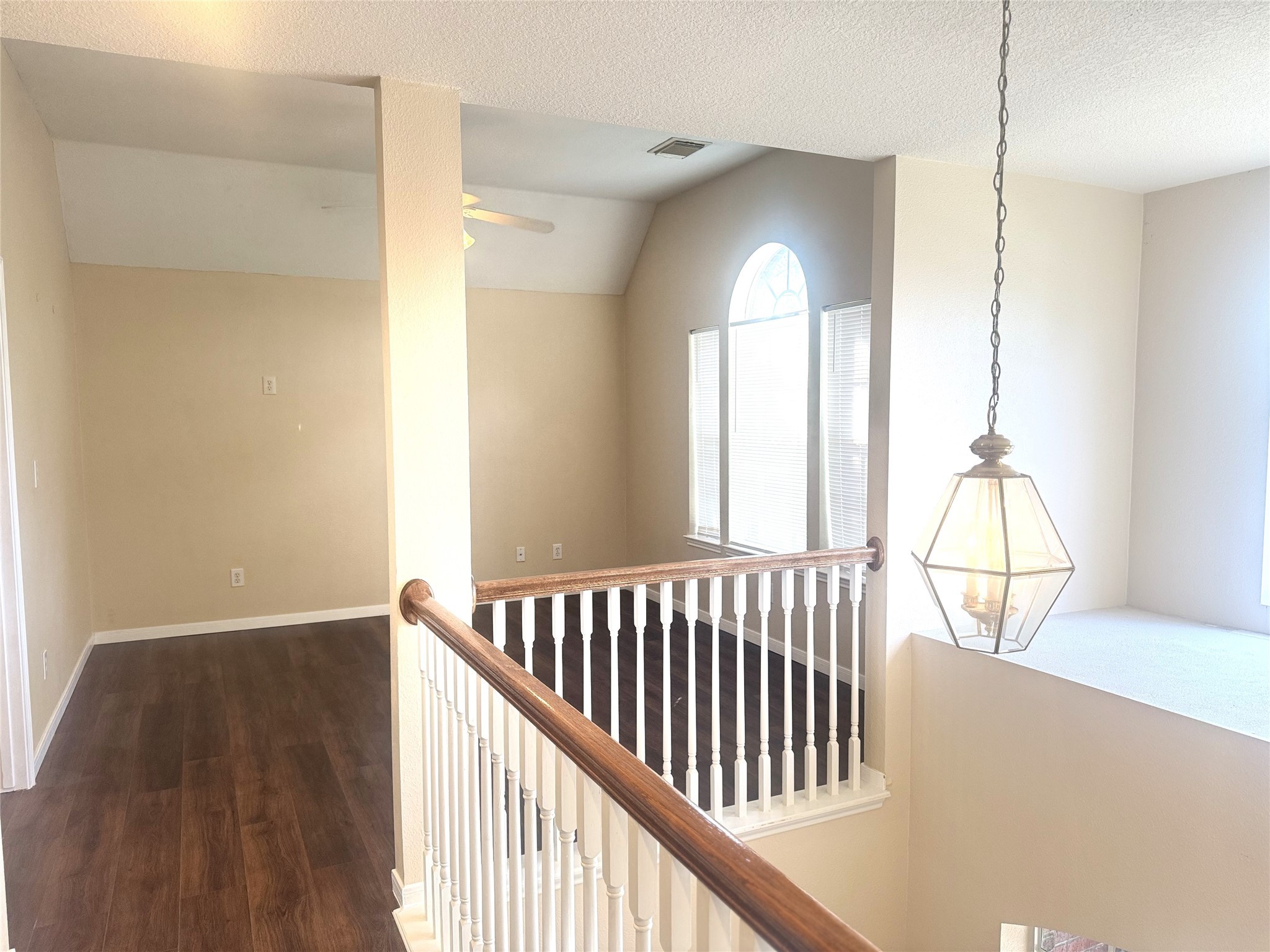 9810 Mossy Tree Lane Houston, TX 77064 - Photo 14 of 24 a view of a livingroom with a window and wooden floor