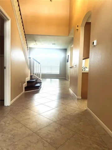 a view of a hallway with entryway