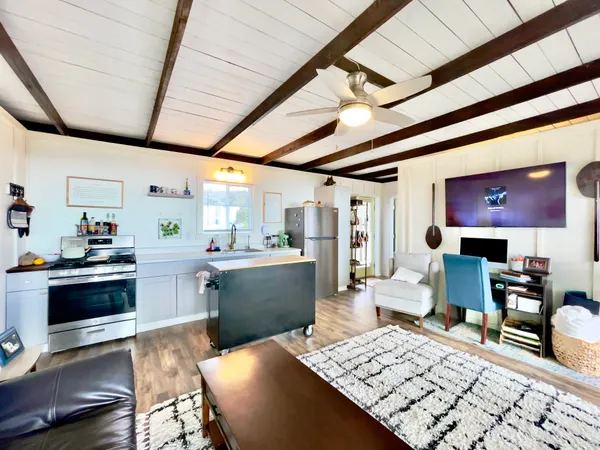 a living room with furniture and a table