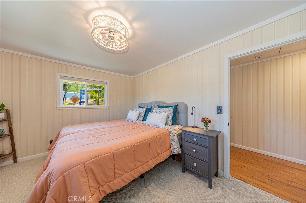 43629 Ranger Cir Drive Coarsegold, CA 93614 - Photo 19 of 54 a bedroom with a bed and a window