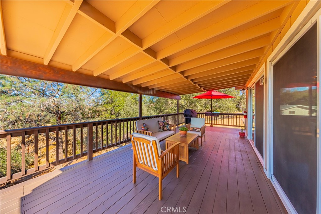 43629 Ranger Cir Drive Coarsegold, CA 93614 - Photo 24 of 54 a view of a two chairs in the balcony