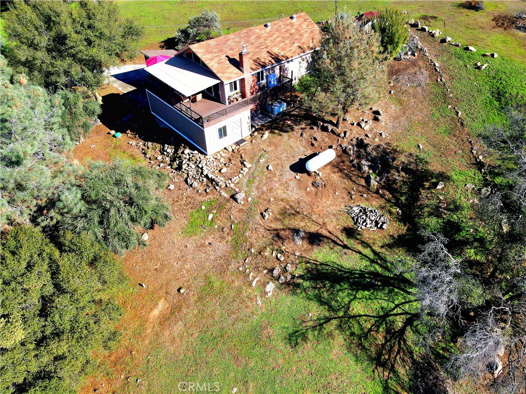 43629 Ranger Cir Drive Coarsegold, CA 93614 - Photo 3 of 54 an aerial view of a house with yard