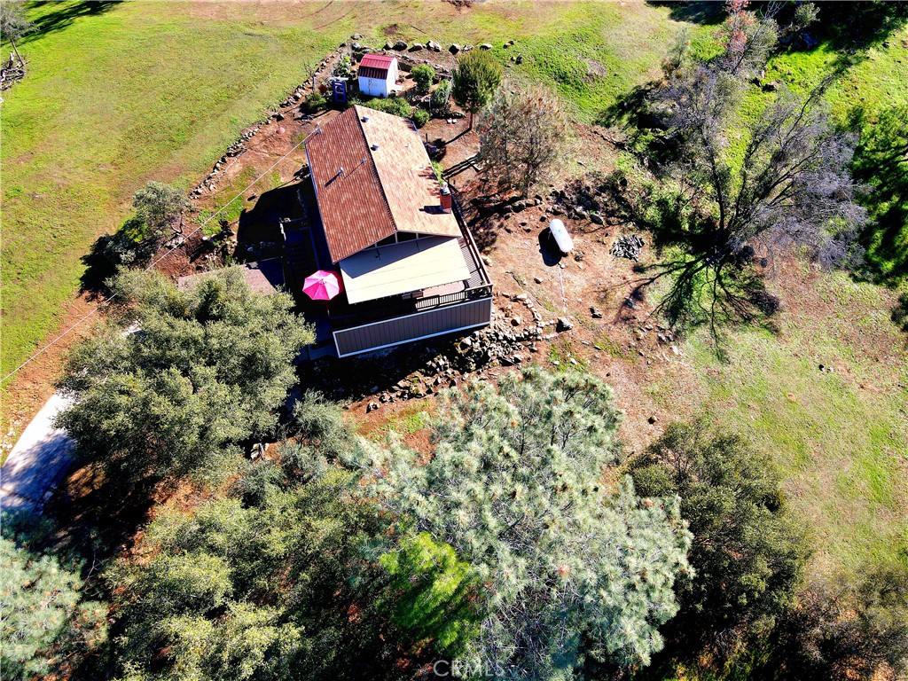 43629 Ranger Cir Drive Coarsegold, CA 93614 - Photo 38 of 54 an aerial view of a house with a yard and lake view