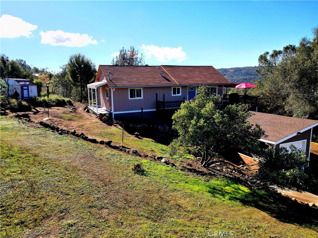 43629 Ranger Cir Drive Coarsegold, CA 93614 - Photo 40 of 54 a view of a house with a big yard and large trees