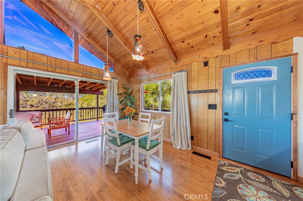 43629 Ranger Cir Drive Coarsegold, CA 93614 - Photo 5 of 54 a dining room with wooden floor and furniture