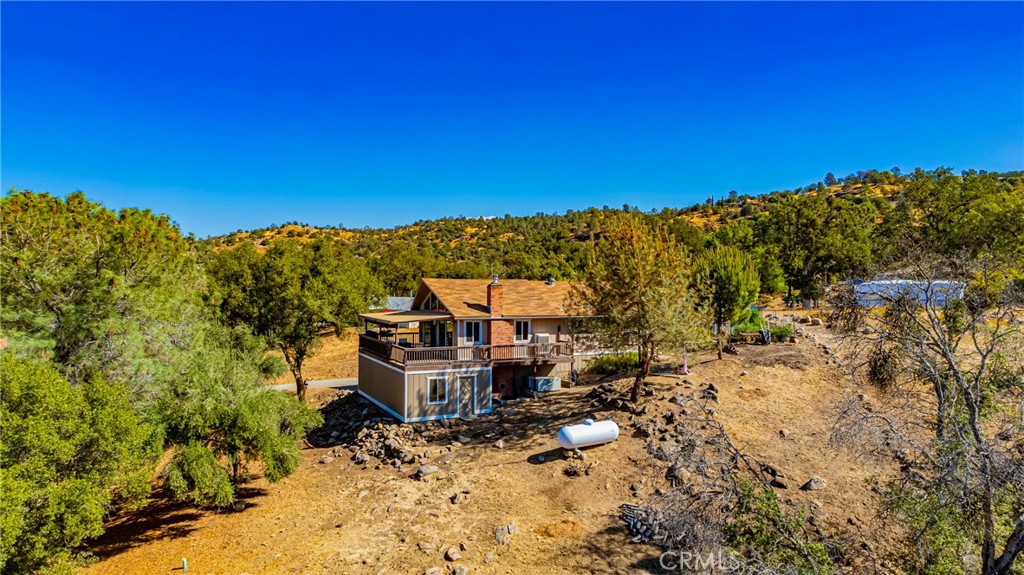 43629 Ranger Cir Drive Coarsegold, CA 93614 - Photo 52 of 54 a view of a house with a yard
