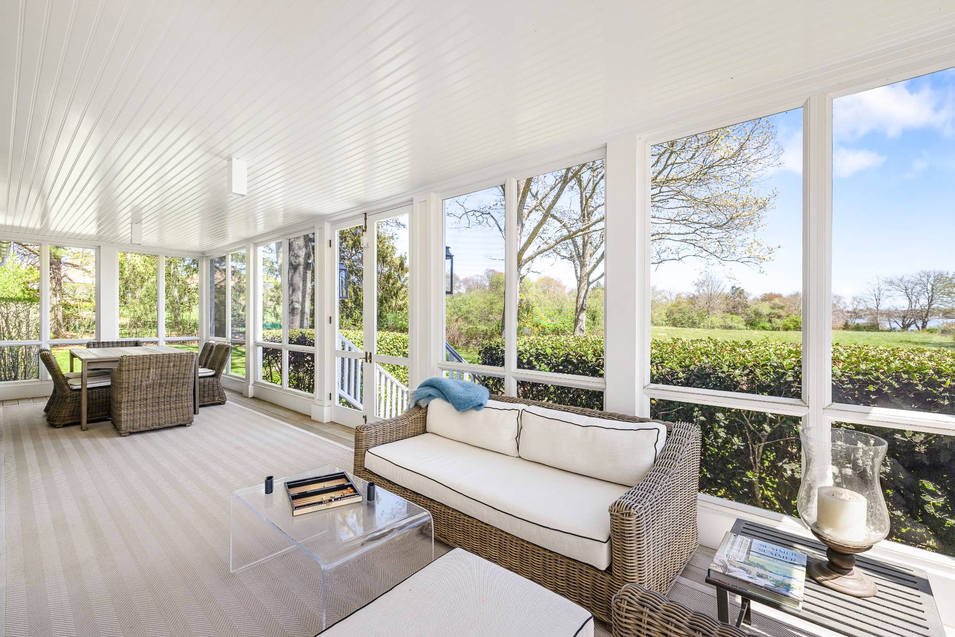 429 Head Of Pond Road Water Mill, NY 11976 - Photo 15 of 22 a living room with furniture large windows and wooden floor