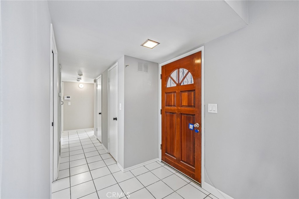 28901 Carmel Road Menifee, CA 92586 - Photo 4 of 47 View of front door entry and hallway