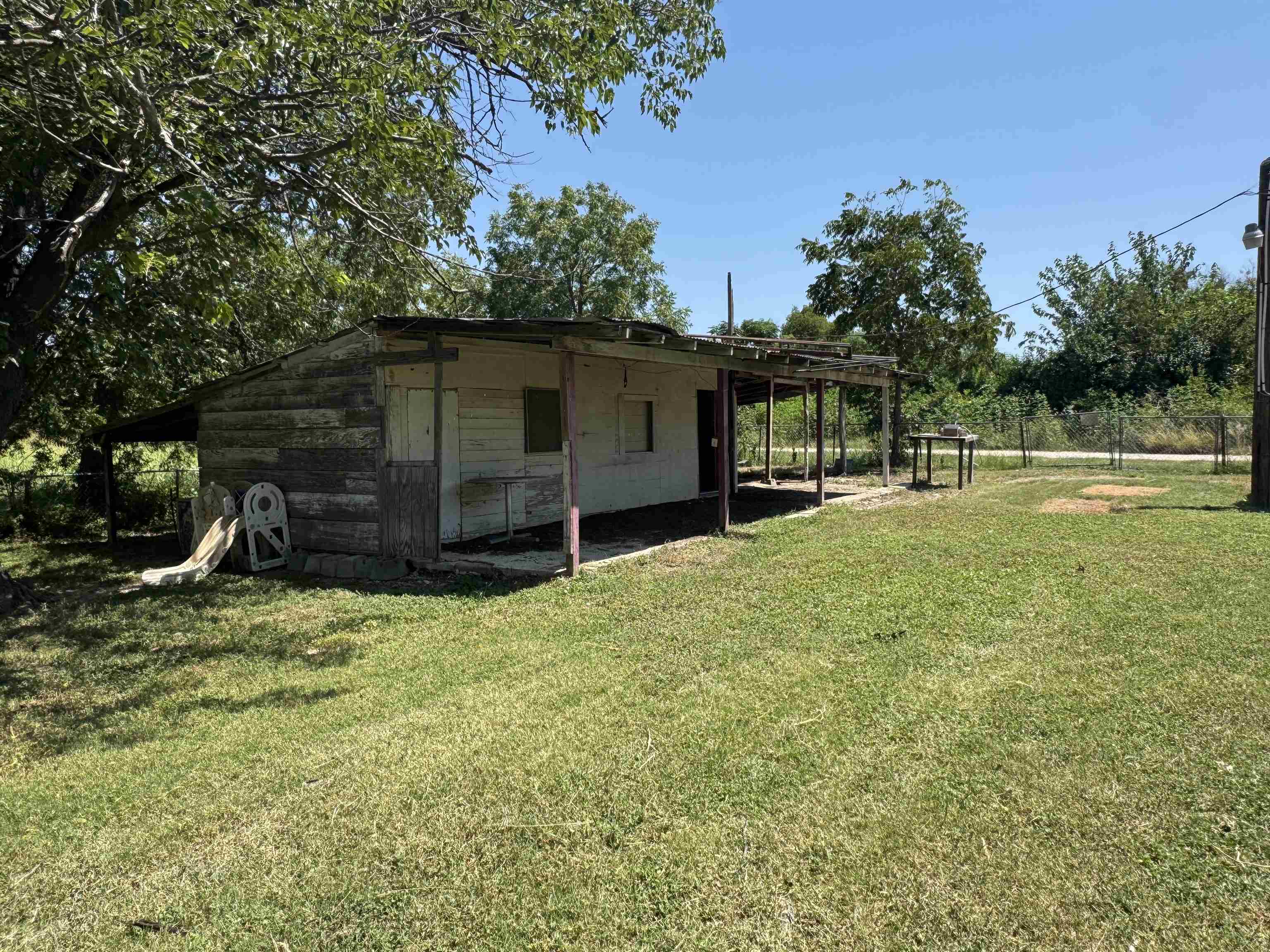 200 North 7th Street Lometa, TX 76853 - Photo 13 of 16 a front view of a house with garden