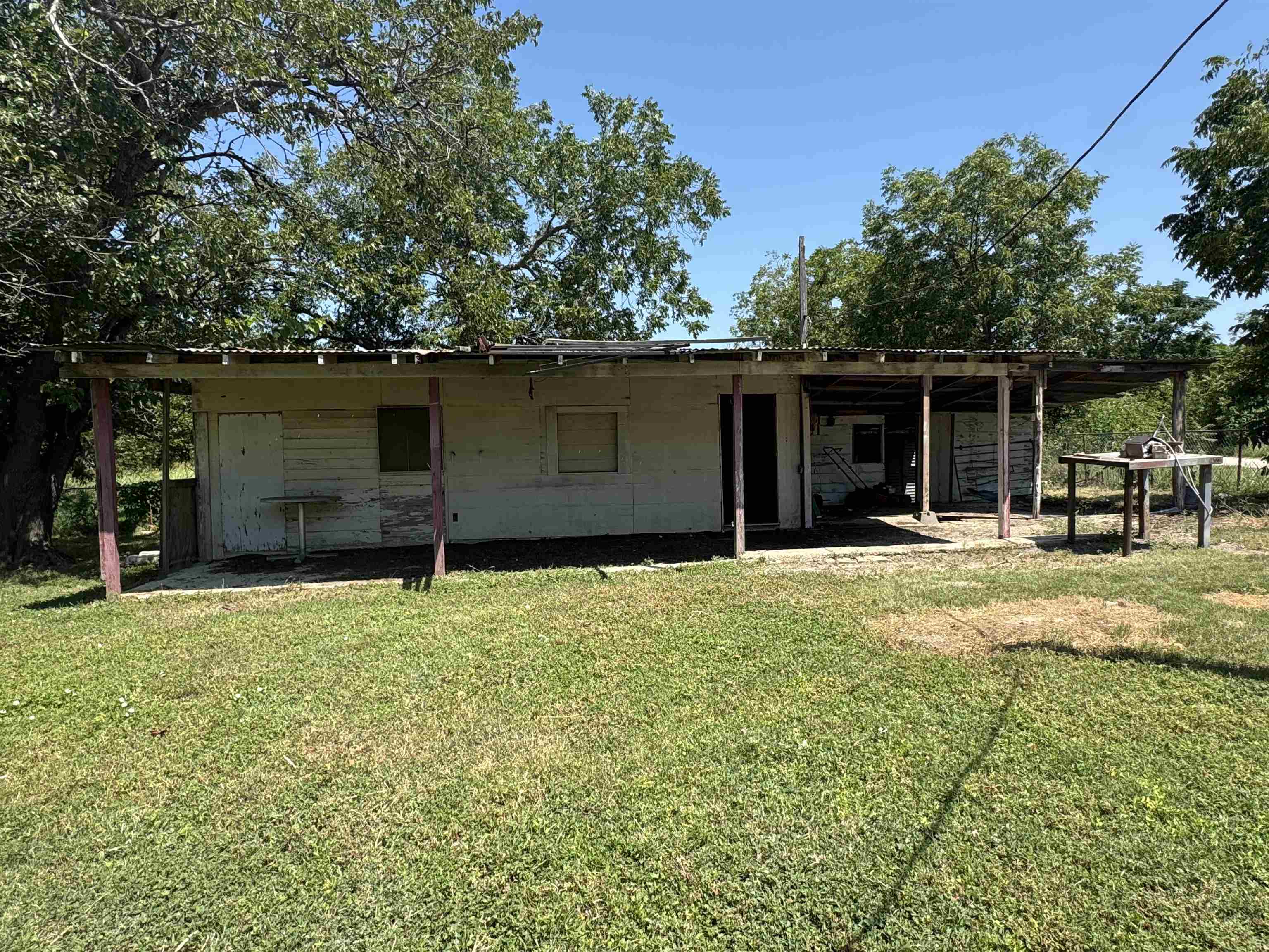 200 North 7th Street Lometa, TX 76853 - Photo 14 of 16 front view of a house with a yard