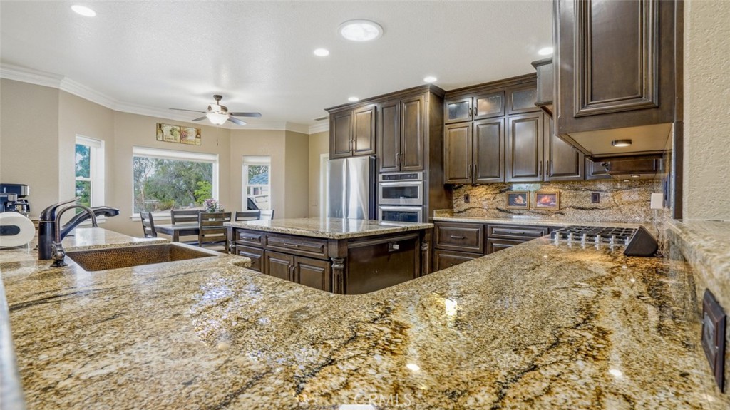 16025 Perry Heights Drive Riverside, CA 92504 - Photo 69 of 105 View of Kitchen From Corner of Living and Dining Room