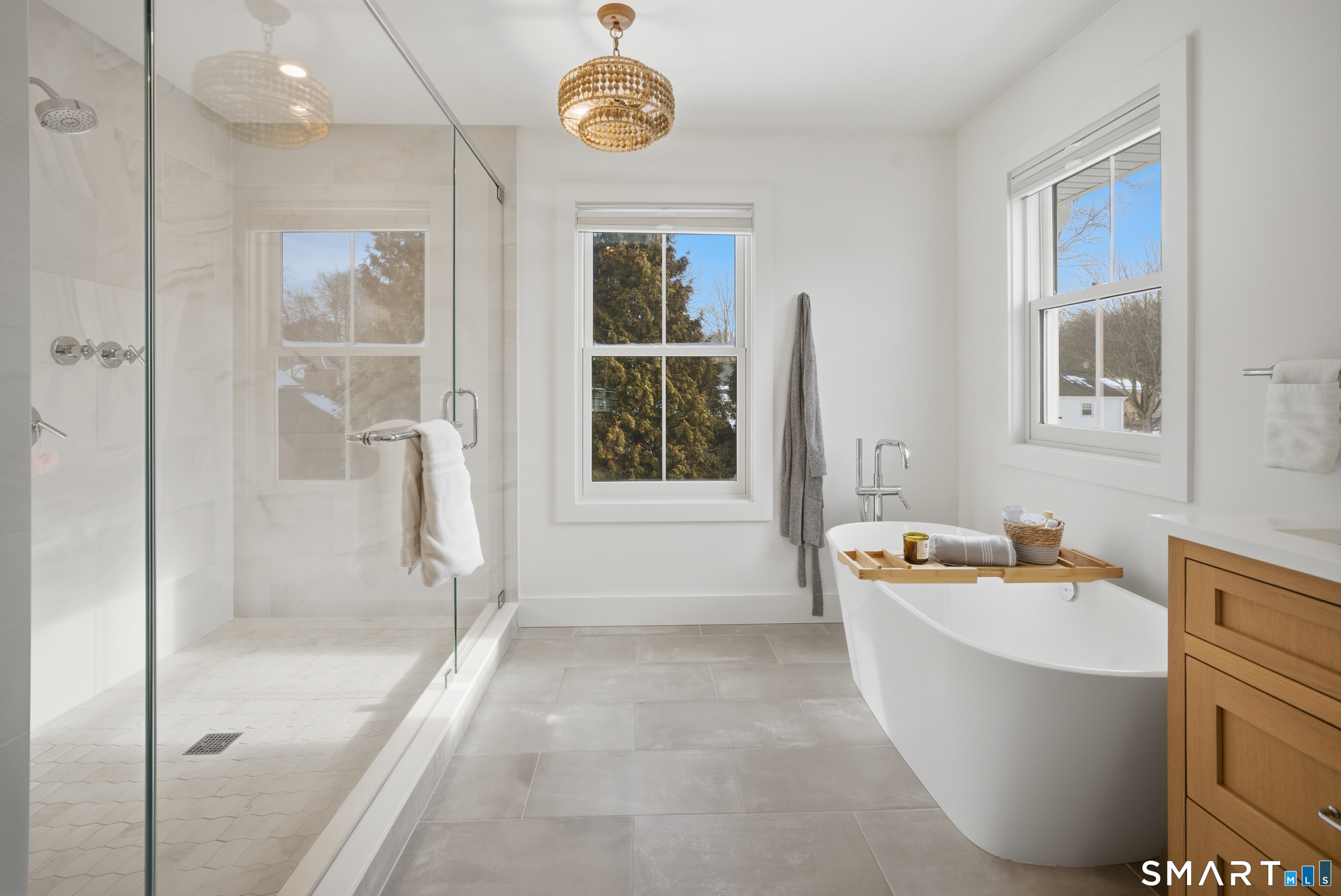 a bathroom with a bathtub and shower