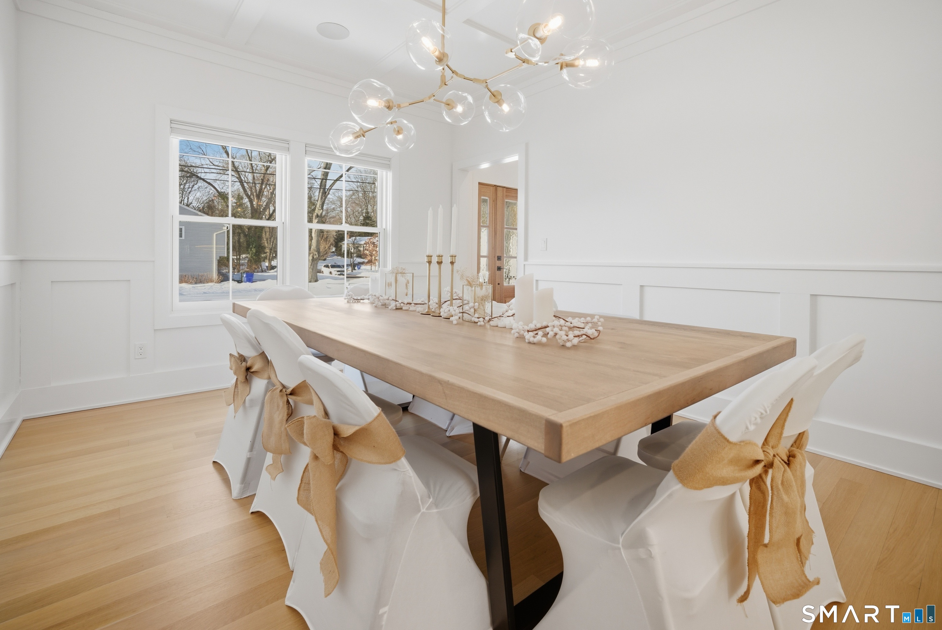 196 Robin Lane Fairfield, CT 06824 - Photo 25 of 37 a view of a table and chairs in a room
