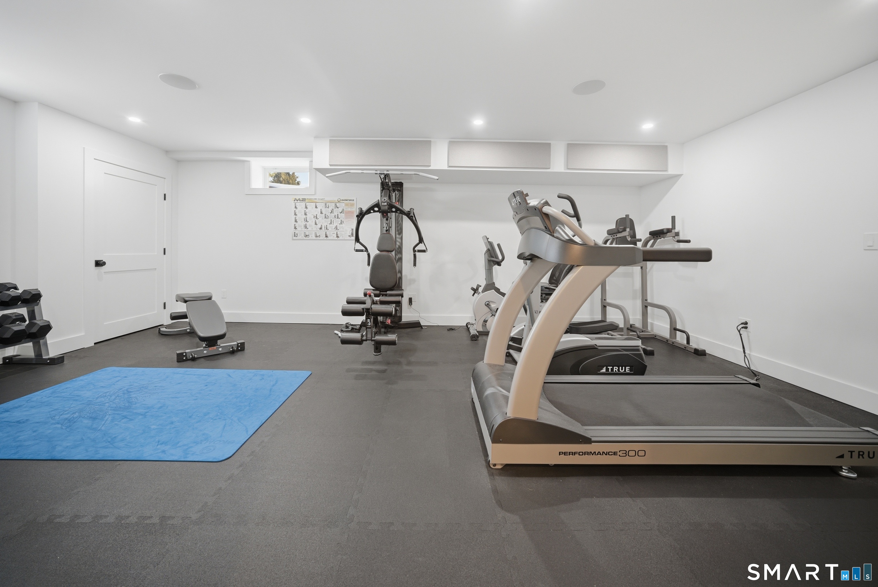 196 Robin Lane Fairfield, CT 06824 - Photo 33 of 37 a view of a room with gym equipment