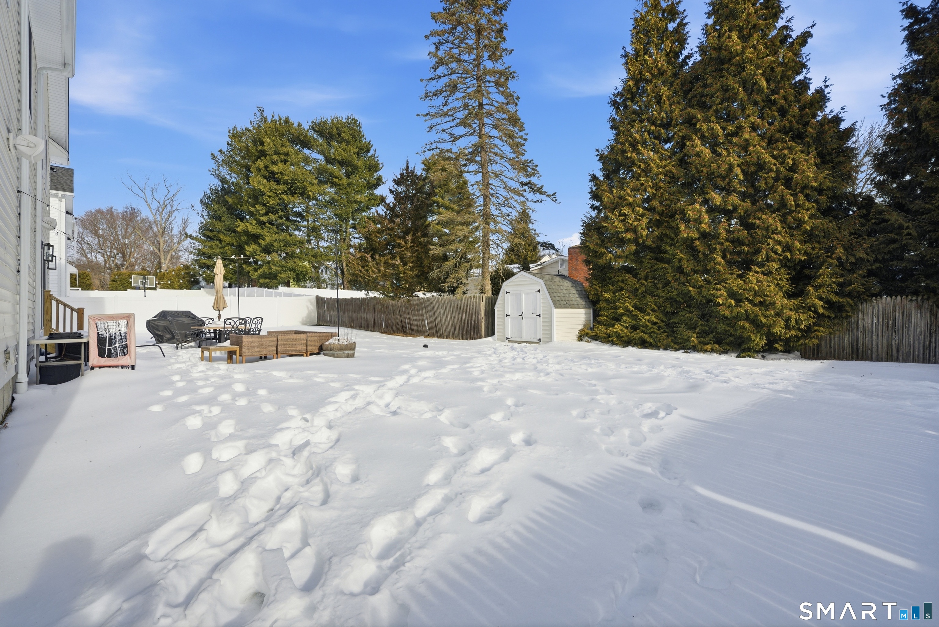 196 Robin Lane Fairfield, CT 06824 - Photo 36 of 37 a view of the backyard of the house