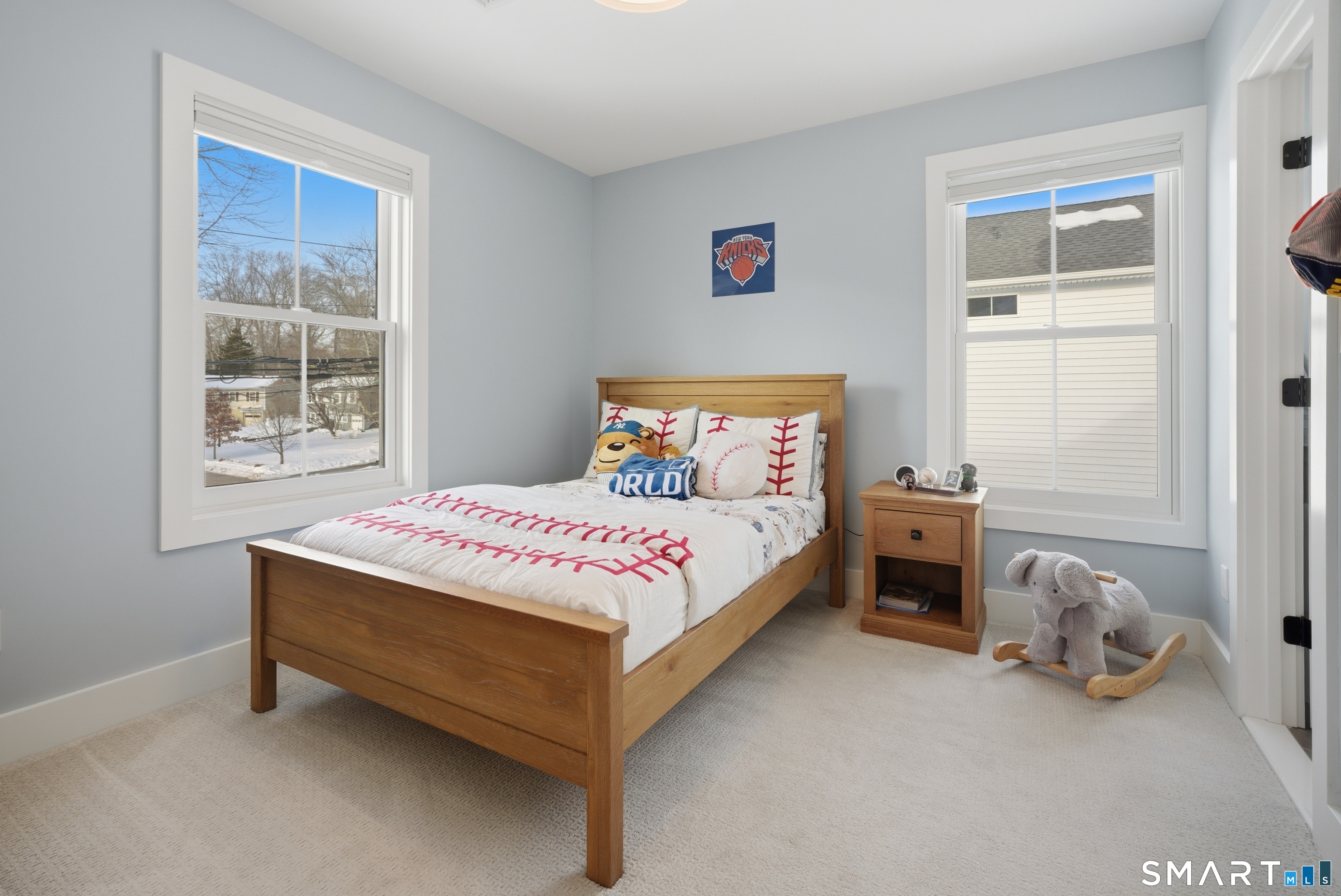 196 Robin Lane Fairfield, CT 06824 - Photo 5 of 37 a bedroom with a bed and a window