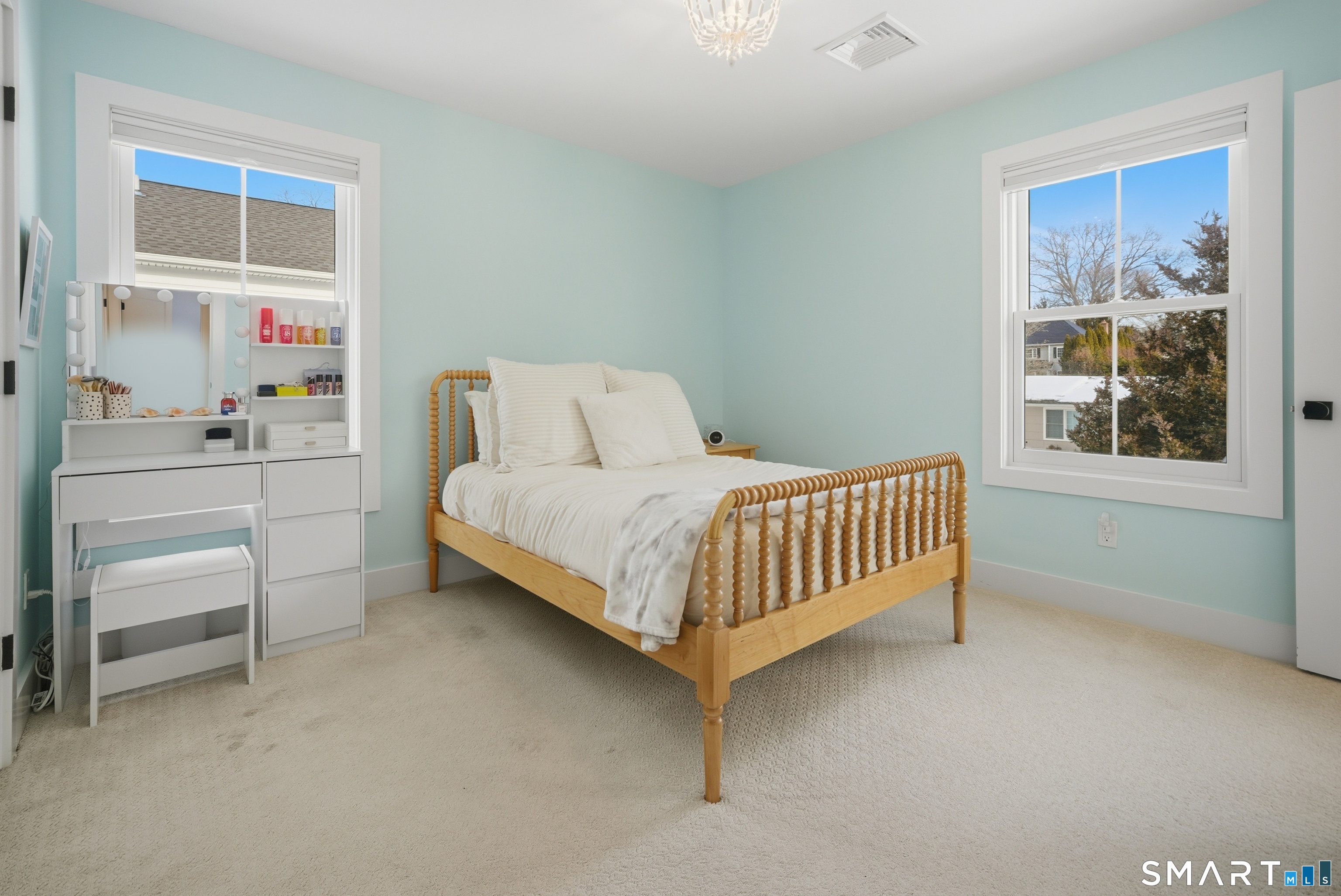 196 Robin Lane Fairfield, CT 06824 - Photo 7 of 37 a bedroom with a bed and a window