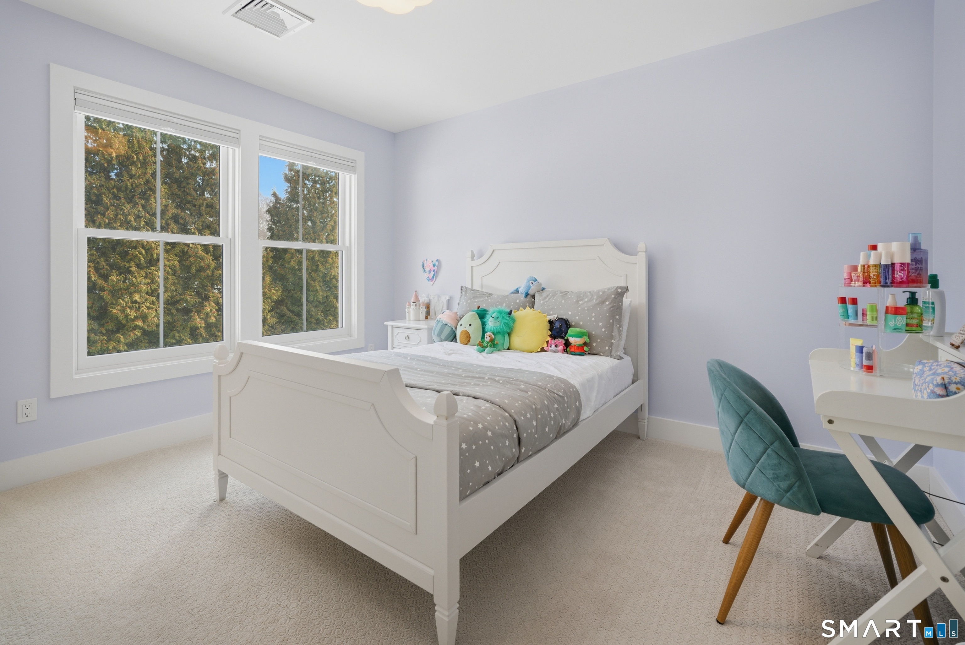 196 Robin Lane Fairfield, CT 06824 - Photo 10 of 37 a bedroom with a bed and a window