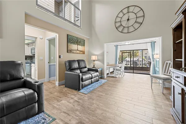 a bedroom with a bed and window with mirror