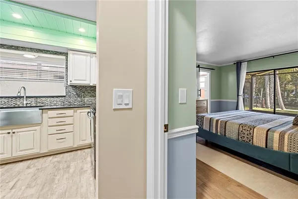 a kitchen with stainless steel appliances granite countertop a stove and a refrigerator