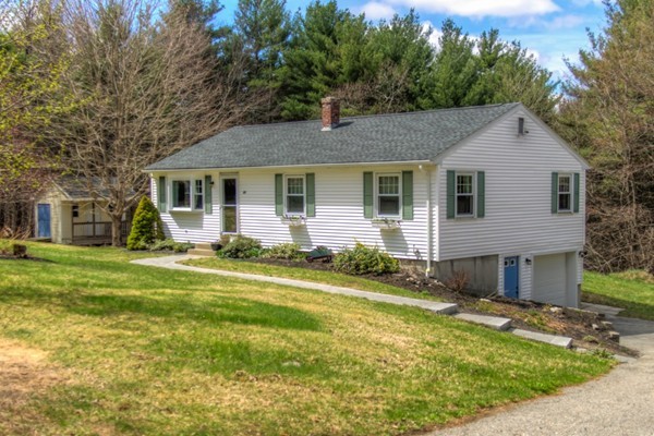 80 Partridge Hill Road Charlton, MA 01507 - Photo 1 of 16 a front view of a house with a yard